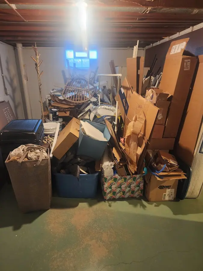 Roll-off dumpster container at job site for Concrete Dumpster Rental in Gifford