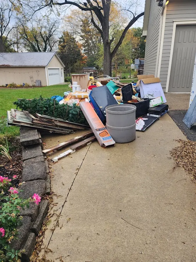 Dumpster being loaded with debris for 3 Yard Dumpster Rental in Gifford